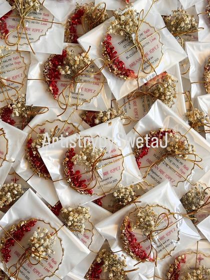 A sea of blessings. This image shows the full batch of 100 baptism return favors, each one individually wrapped and ready to be gifted.