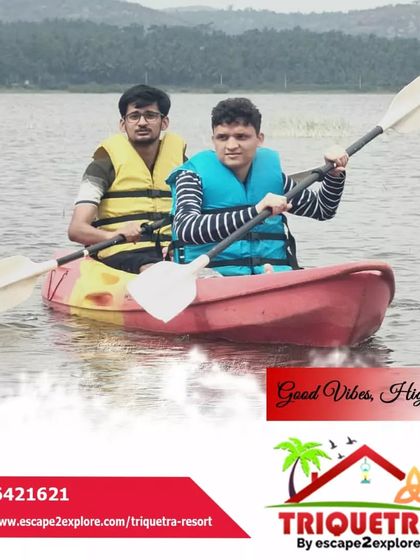 Good vibes and high tides. Two friends enjoying their time paddling on the calm waters of the reservoir.