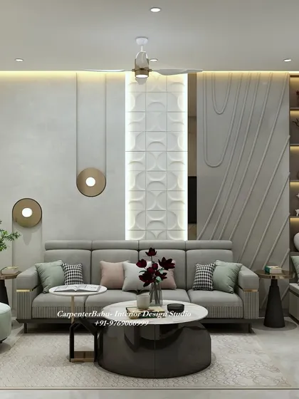 This living room wall is a study in texture, with a mix of 3D panels in different patterns. The design is modern, artistic, and adds a lot of character to the room.