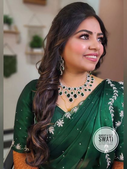 An engagement makeover for our bride Henoy. My artist Swati created this beautiful look with a green saree and sparkling diamond jewellery.