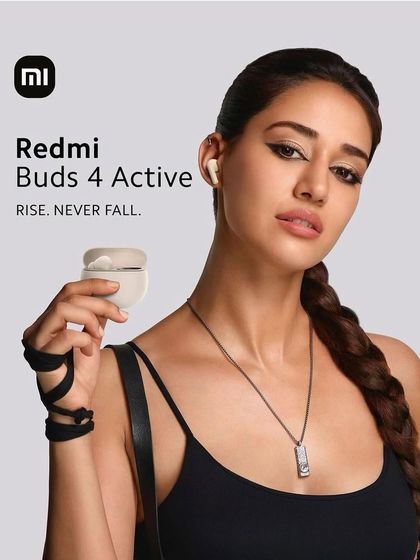 A bold and edgy makeup look for Disha Patani's Redmi Buds 4 Active campaign. The sharp winged eyeliner and strong brow were designed to match the "Rise. Never Fall." tagline.