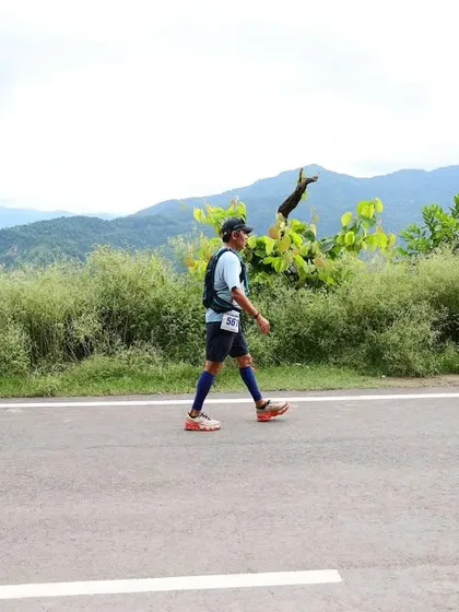 An athlete taking a walking break during the Lake to Lake Ultra. Knowing when to conserve energy is a critical part of ultramarathon strategy.
