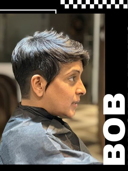 A side profile of the pixie bob, showing the clean lines and expert layering that create this chic look.