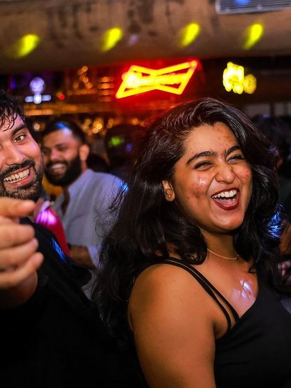 Pure laughter and joy on the dance floor. This is the kind of uninhibited fun I love to see at my parties.