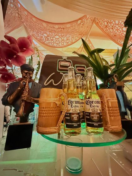 Another angle of our eclectic whiskey station, showing the unique combination of props and lighting.