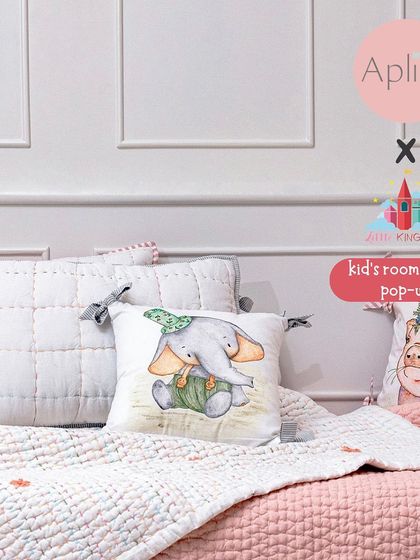 Aplito Home creates beautiful handcrafted linens, like these quilted pillow covers and embroidered cushions, that add a touch of softness and charm to any child's bed.