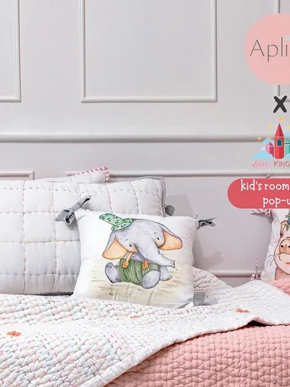 Aplito Home creates beautiful handcrafted linens, like these quilted pillow covers and embroidered cushions, that add a touch of softness and charm to any child's bed.