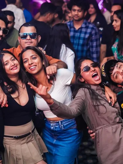Friends having a great time on the dance floor. My parties are all about creating fun, shareable moments.