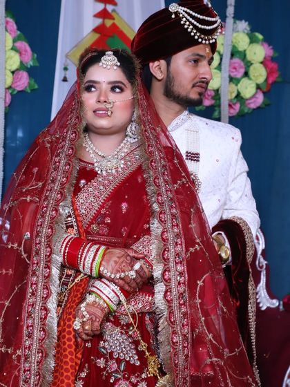 A lovely portrait of the bride and groom. Her makeup is designed to be picture-perfect.