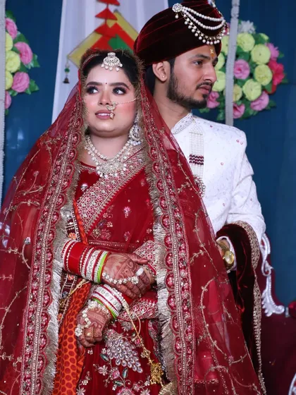 A lovely portrait of the bride and groom. Her makeup is designed to be picture-perfect.