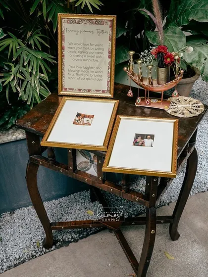 A "Framing Memory Together" station, where guests can leave notes and wishes for the couple.