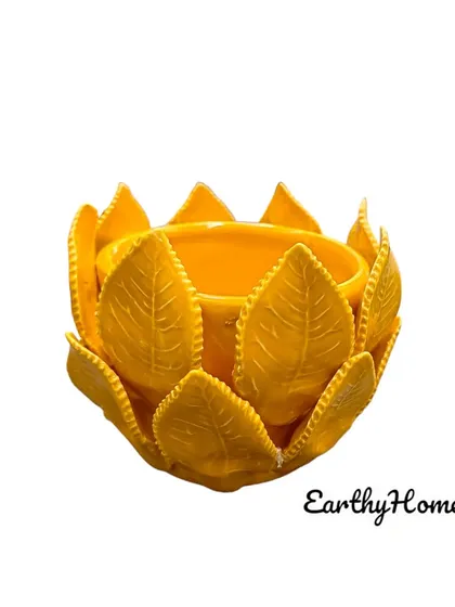 The same lotus tea light holder is also available in a vibrant yellow.