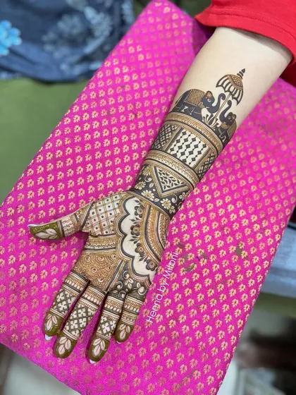 A single-arm view of the elephant and chatri design. The intricate details and bold patterns make this a standout piece.