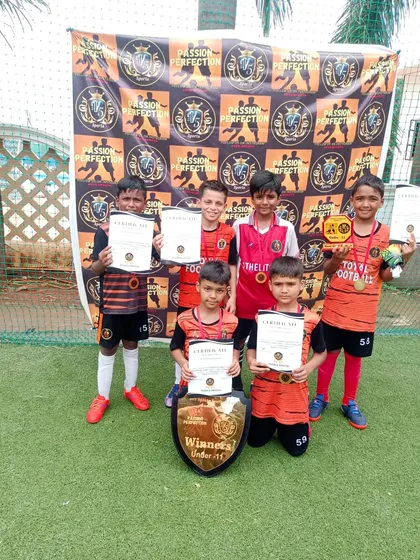 Our U11 champions from the 5v5 Sports Cup 3.0, proudly displaying their certificates and trophy.