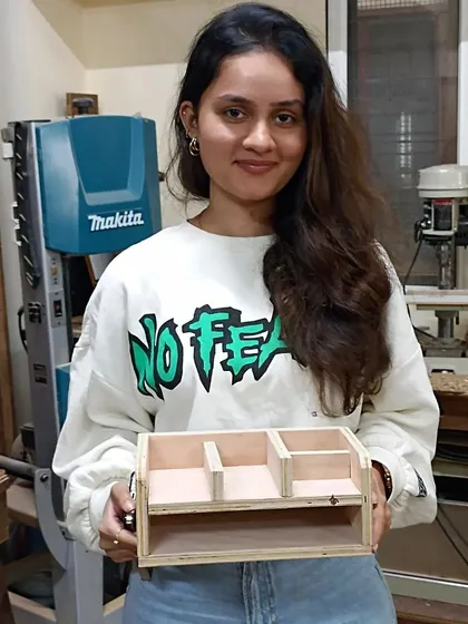 This student created a clean, minimalist desk caddy with multiple compartments. It's a great exercise in creating precise box joints and dividers.