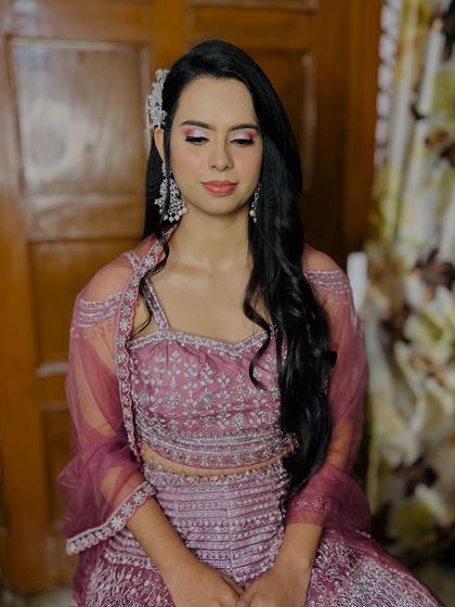 A serene portrait, her makeup looking flawless.