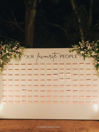 An elegant seating chart display that reads 'Our Favourite People', making guests feel welcomed and cherished.