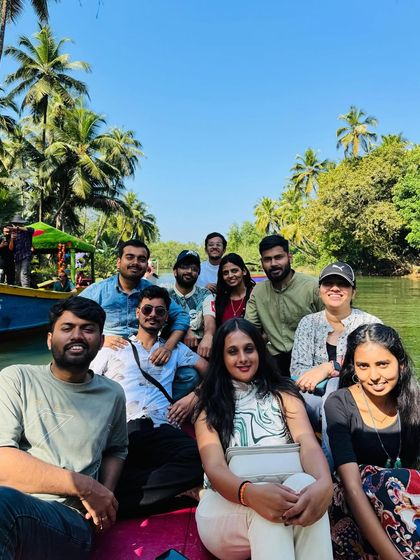 A happy group enjoying the scenic backwater boat ride in Honnavar.