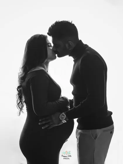 We love playing with light and shadow to create timeless black and white portraits. This intimate kiss captures the deep connection between the couple in a simple, yet powerful way.