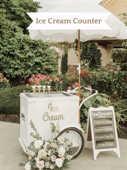 An elegant Ice Cream cart, perfect for an outdoor wedding. We can customize the cart and menu to match your theme, offering a cool and classic dessert option.