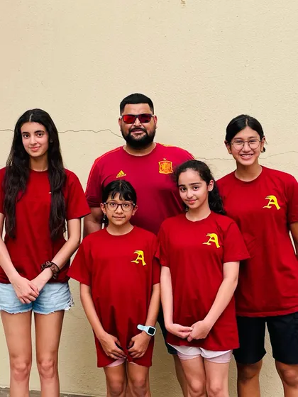 The Ace Aquatic Academy team sporting our new colors. While the look may change, the vision of achieving excellence remains the same.