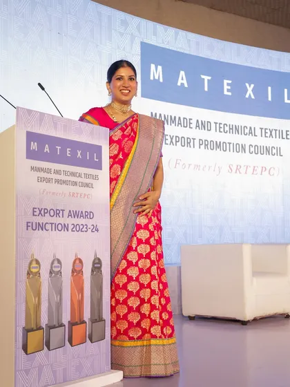 Posing by the lectern at the Export Awards. This image reflects the professional and polished presence I bring to every corporate function.