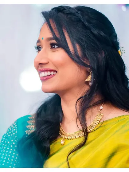 Every photo from this series radiates pure love. Shwetha's makeup is minimal and fresh, letting her happiness shine through.