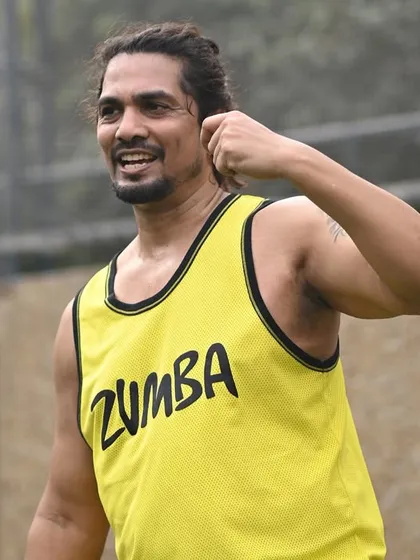A close-up of our instructor leading the Zumba session with a smile. We focus on creating a welcoming and motivating atmosphere for all participants.