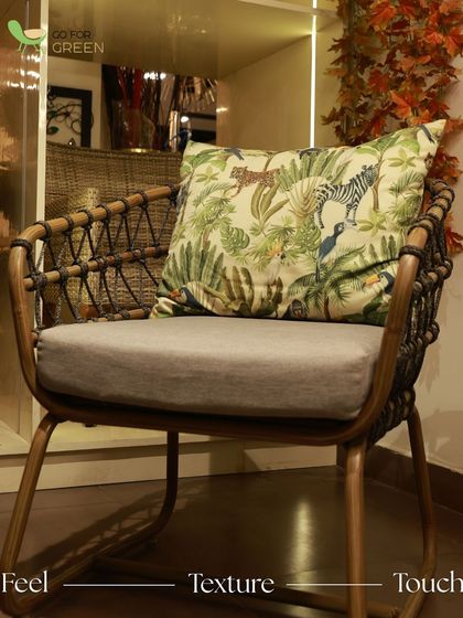 Our Rope Chair GFG29, shown here with a custom jungle-print cushion. You can personalize any of our pieces with your choice of fabric to create a look that is uniquely yours.