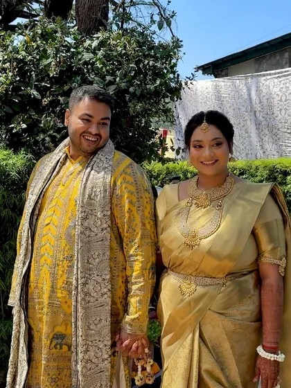 A happy couple shot from the Haldi ceremony. The bride's makeup is traditional and timeless.