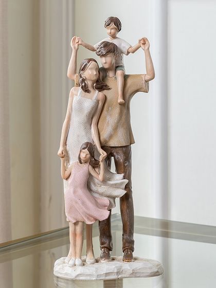 This heartwarming showpiece captures a beautiful family moment. The gentle, neutral tones and loving posture make it a perfect symbol of unity and togetherness for your family's living space.