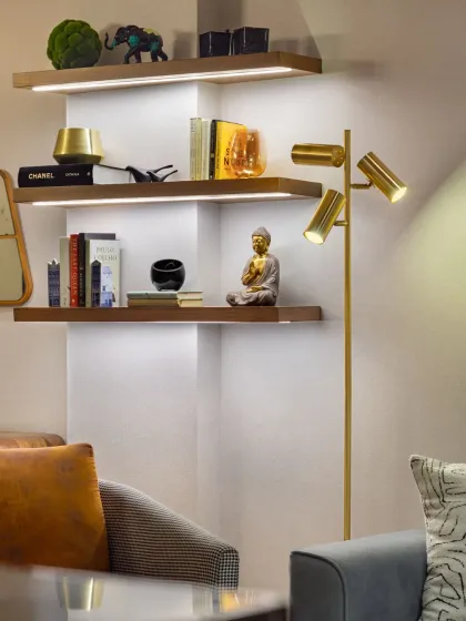 We designed these floating, back-lit bookshelves at Rue 32 to be both a storage solution and a design feature. They provide an airy, graceful display for books and collectibles, while the adjacent floor lamp adds a layer of warm, ambient light.