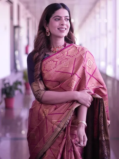 Every saree tells a story. This beautiful silk saree with intricate patterns is all about grace and timeless beauty.