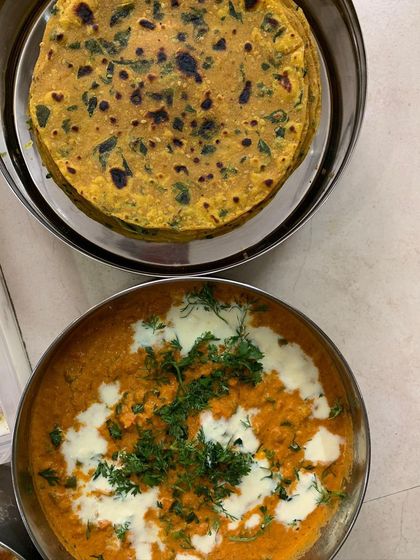 The simple things are often the best. Here are some fresh Methi Theplas and a bowl of rich, creamy paneer gravy, a combination that never disappoints.