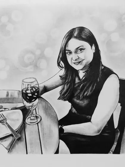 A sophisticated black and white portrait of a woman enjoying a glass of wine. I used charcoal to create the soft, out-of-focus background, making the subject stand out.