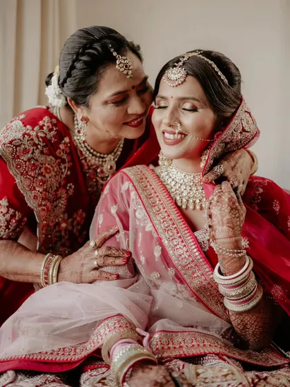 A beautiful, tender moment between the bride and her mother. The love and affection in this photo are palpable.