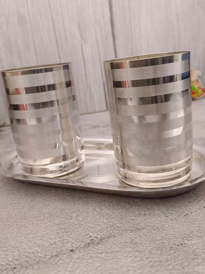 Another view of the two-glass SS tray set, showing the modern striped design on the glasses.