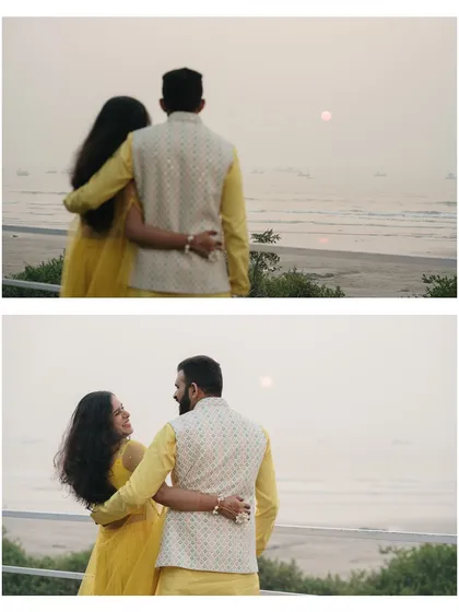 A romantic sunset portrait during the Haldi celebrations. The couple looking out at the ocean creates a serene and hopeful image for their future together.