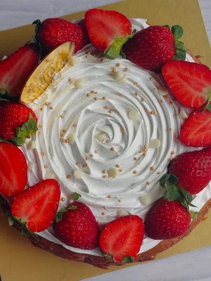 My Strawberry Tea Cake is a celebration of the fruit. A fluffy cake base is topped with a beautiful rosette of whipped cream and decorated with fresh, juicy strawberries.
