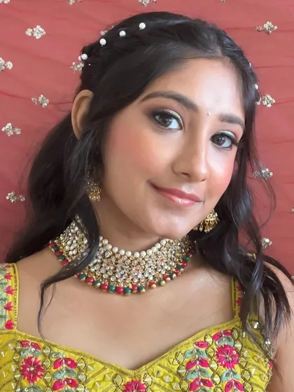 A soft and glamorous look for a bridesmaid. I gave her gentle beach waves in her hair and a makeup look that features shimmery eyes and a natural pink lip.