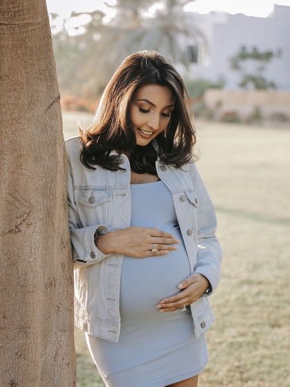 A quiet, beautiful moment for this mom to be. Her makeup for this outdoor maternity shoot was kept very natural and fresh to complement the soft, golden hour light.