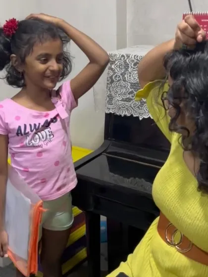 A candid moment of connection between a student and teacher. These small interactions are the heart of our school.