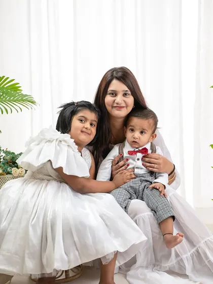 A beautiful portrait of a mother with her two children. My studio sessions are designed to capture the unique bond each family shares.