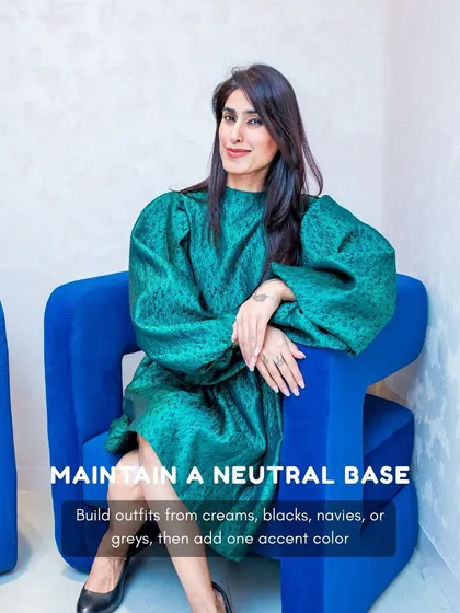 Looking luxurious is more about strategy than spending. This look, featuring a bold green dress, demonstrates how a strong color and silhouette can create an expensive feel.
