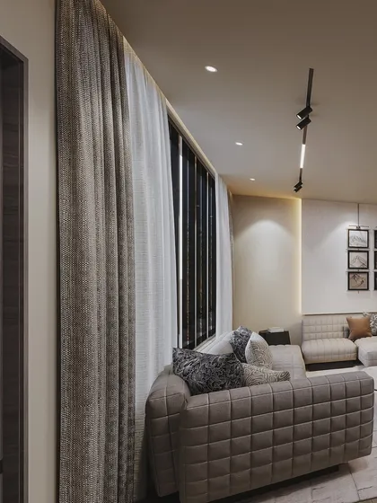 A close-up on the quilted texture of the sofa, highlighting the tactile quality of the materials chosen for the design.