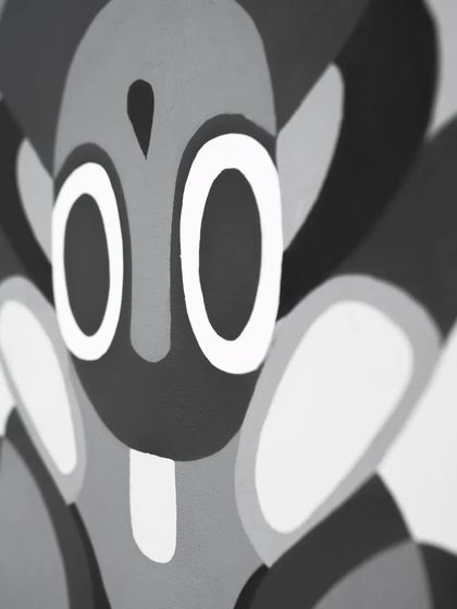 A detail of a central figure in the 'Aab' painting, embodying the spirit of water.