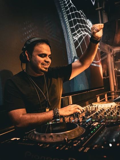 A moment of connection with the crowd, fist pump in the air. This is me feeling the energy of the room and giving it right back through the music.