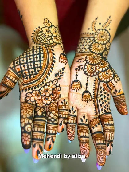 A beautiful design with jhumka motifs and floral patterns.