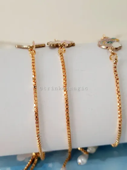 A view of the back of the adjustable kids' charm bracelets, showing the sliding clasp that ensures a perfect fit for any little wrist.