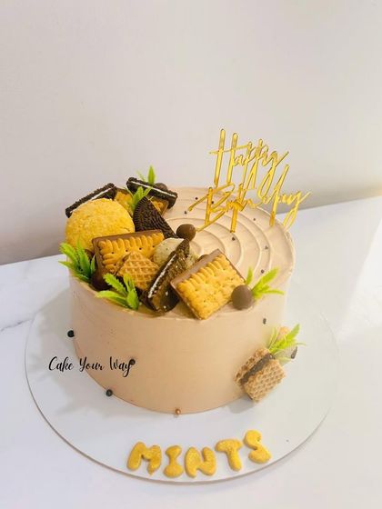 This one was very special, baked for someone dear. A delicious-looking coffee and biscuit-themed cake.